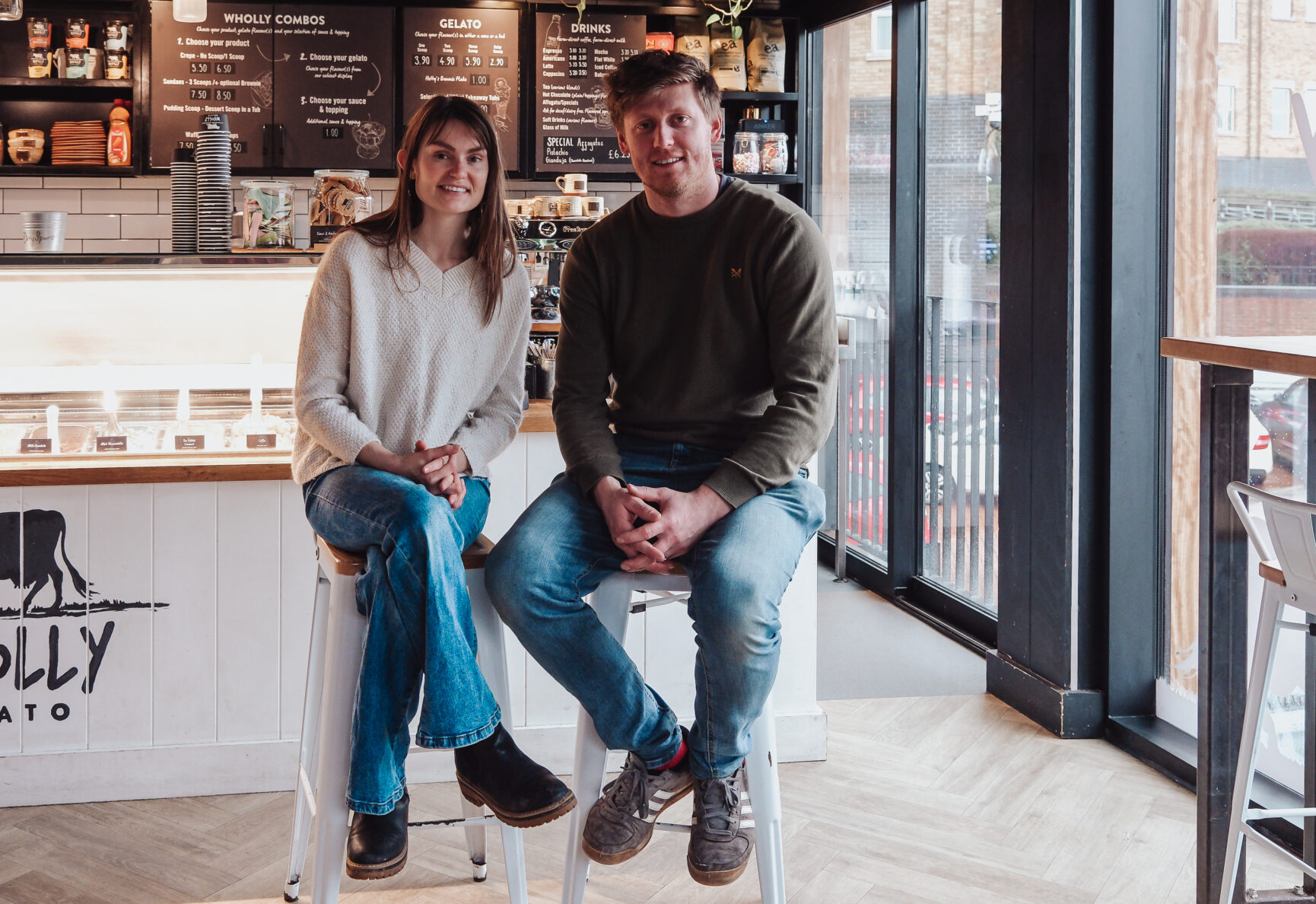 Emily and Will sat in front of the Gelato Bar in Wholly Gelato at the Food Dock Gloucester.